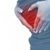 Чому болить живіт на ранніх термінах вагітності