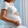 Чому при вагітності може німіти низ чи верх живота, що це означає?
